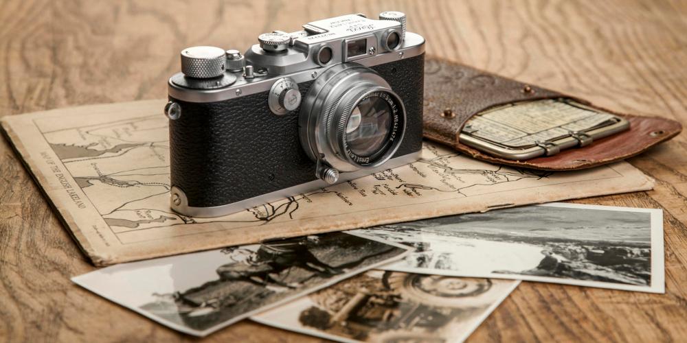 Wales, Monmouthshire, Monmouth. Vintage Leica camera and Kaufmann Posographe.